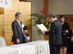 The president Sato attends the ceremony as the offical representative of the group