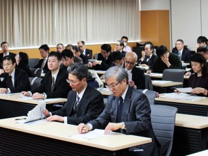 The President SATO and OHKAWARA, Community Relations of Executive Director listen intently