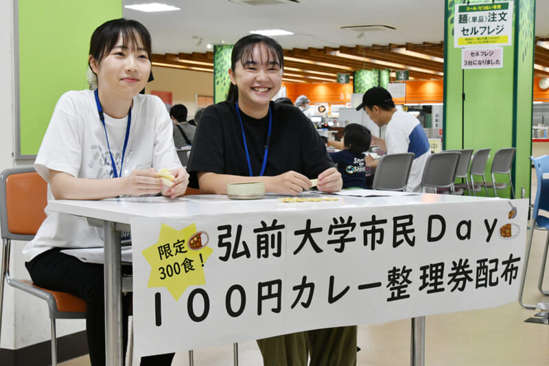 文京食堂店にて100円カレー整理券を配布